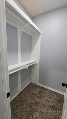 interior-duplex-construction-carpet-drywall-bedroom-closet